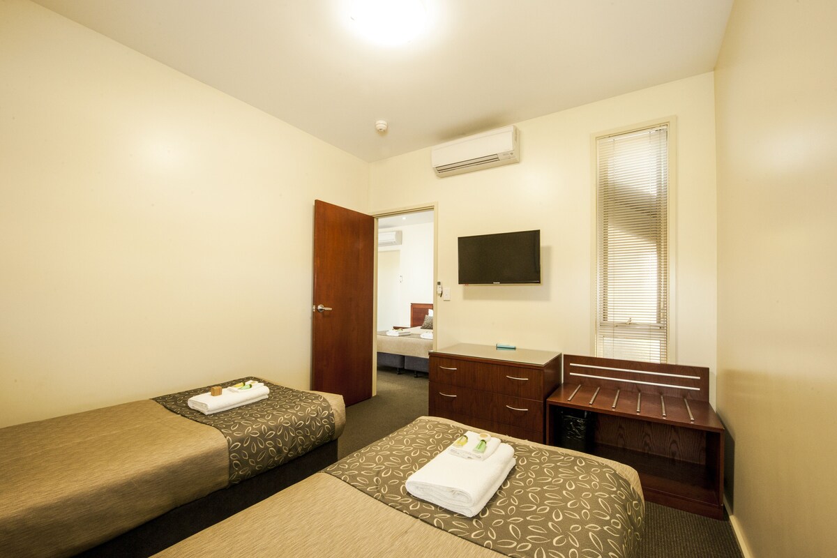 Family Room | Desk, soundproofing, iron/ironing board, cots/infant beds
