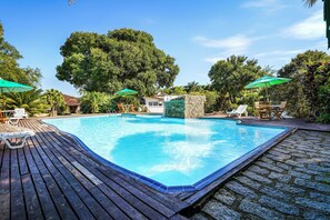 Outdoor pool, pool umbrellas, sun loungers