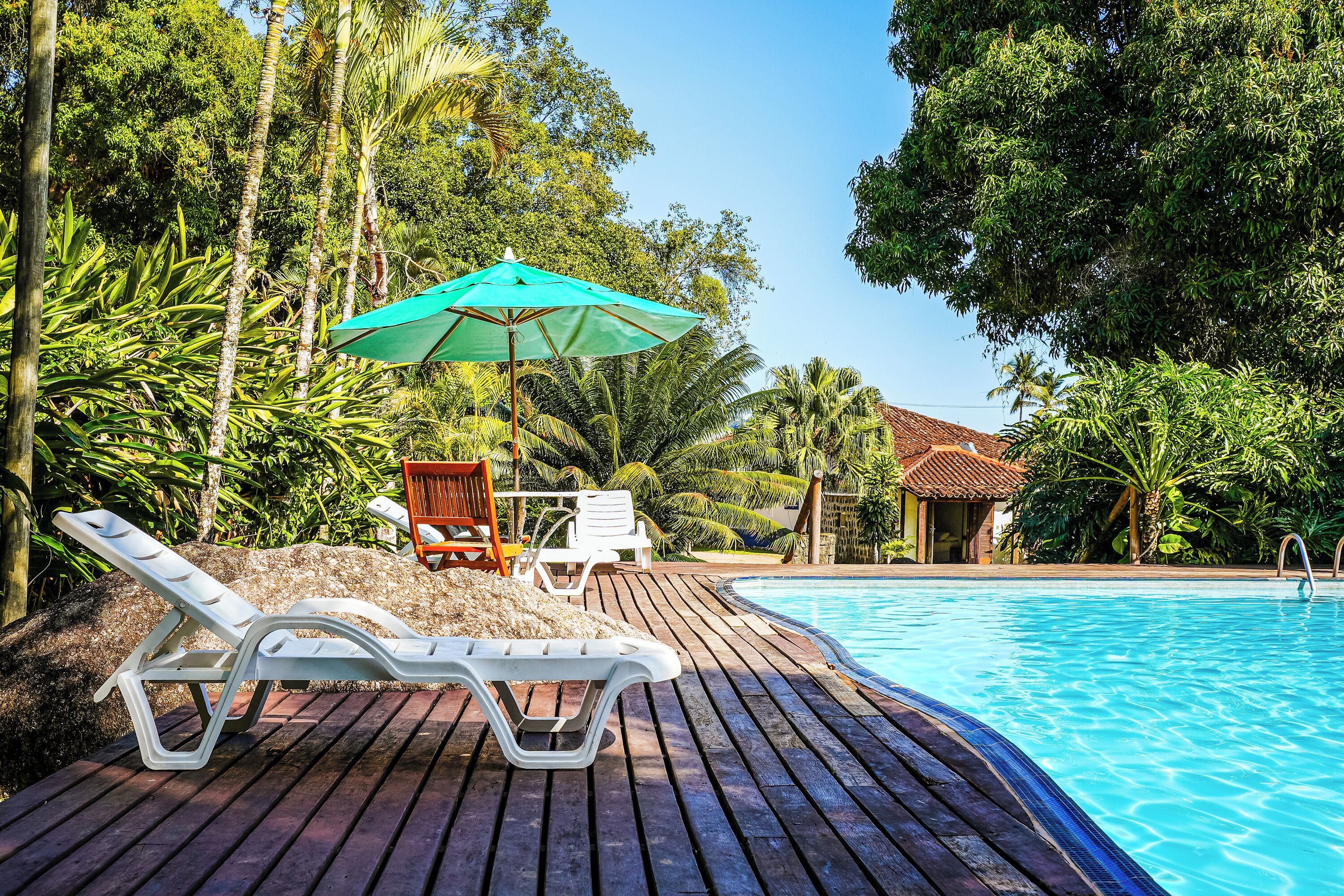 Outdoor pool, pool umbrellas, sun loungers