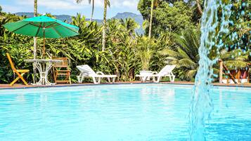 Outdoor pool, pool umbrellas, sun loungers