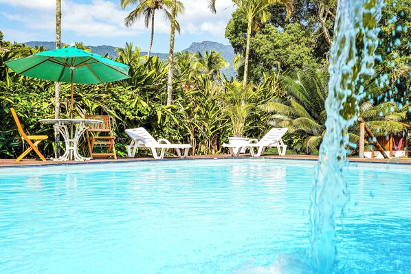 Outdoor pool, pool umbrellas, pool loungers