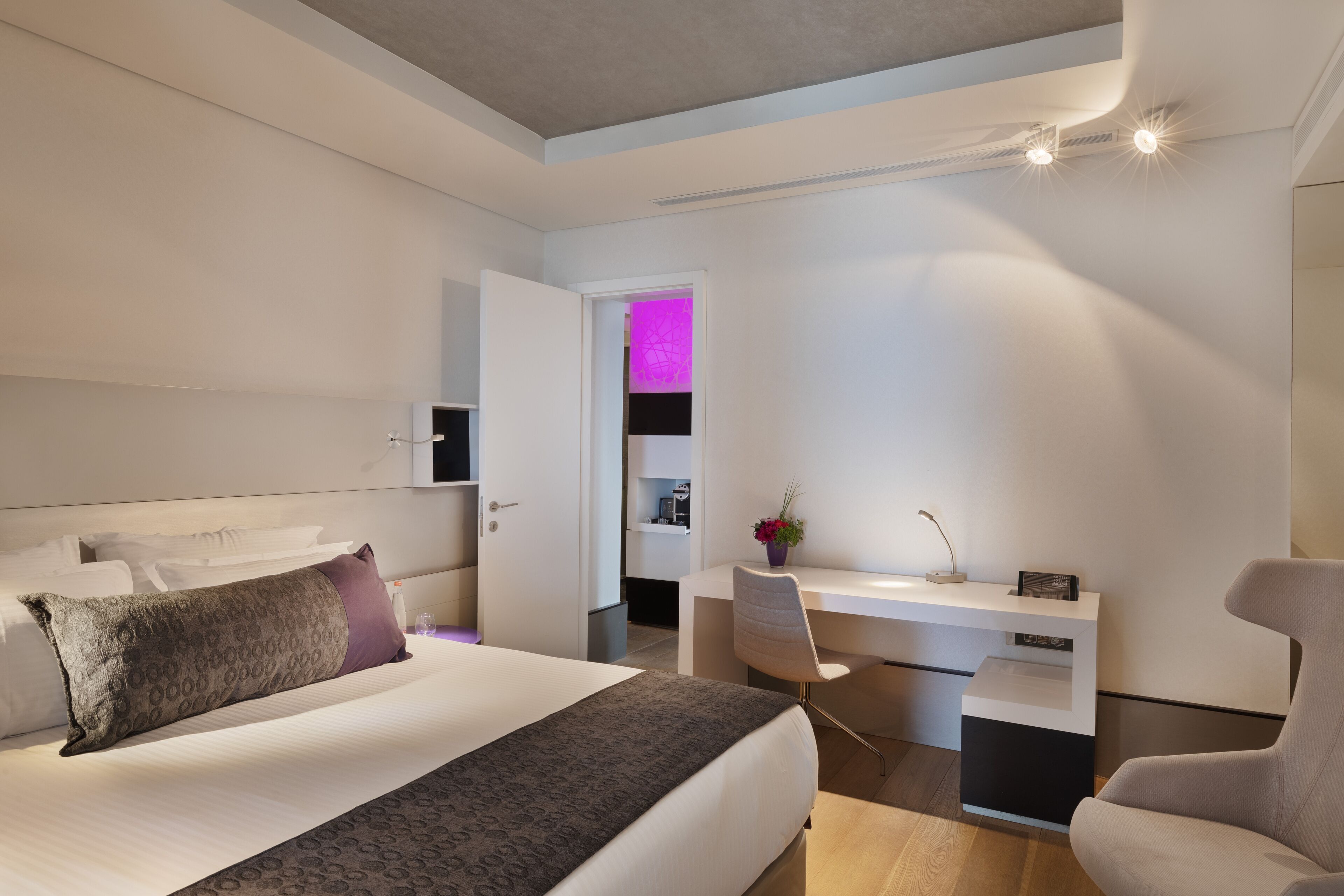 Premium bedding, down duvets, minibar, in-room safe