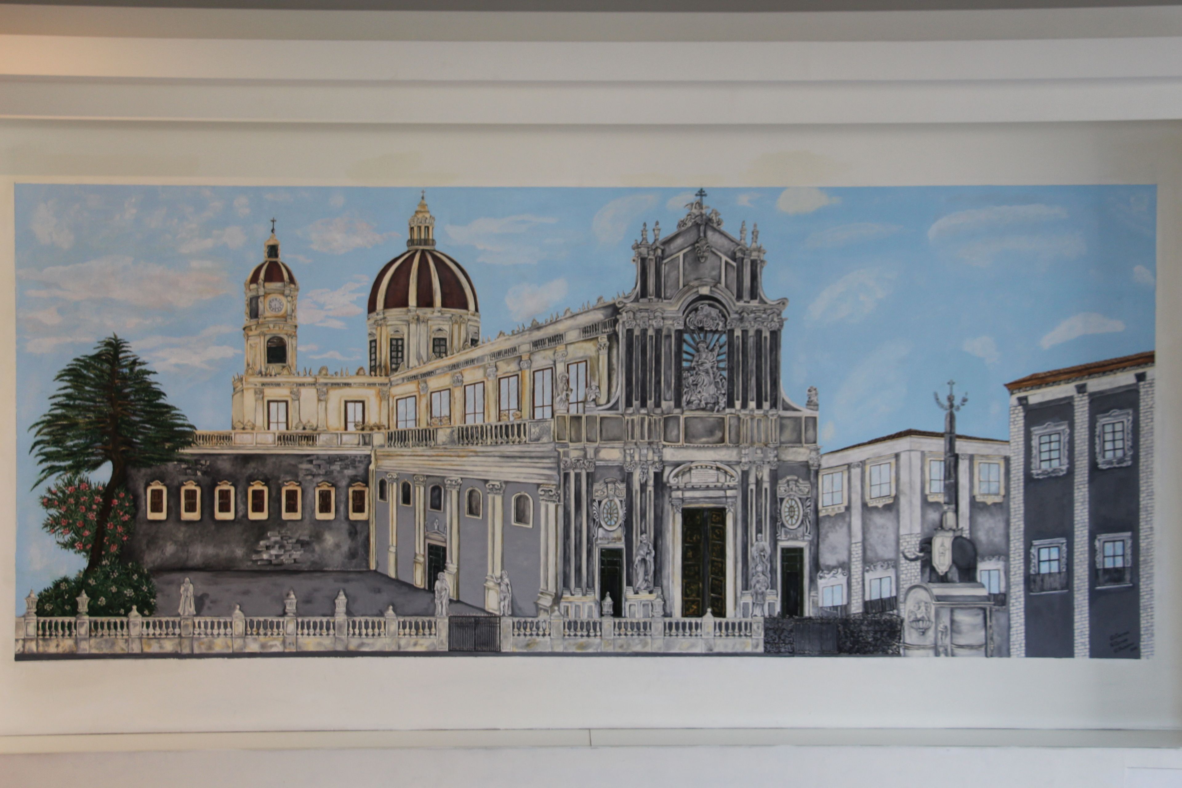 A detailed mural of a grand building with a dome, columns, and statues.