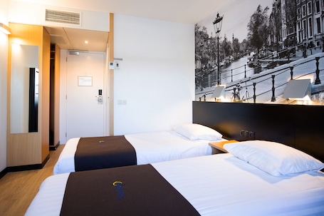Deluxe Room, 2 Twin Beds | In-room safe, desk, iron/ironing board, free cribs/infant beds