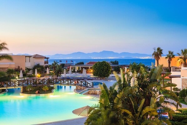 Indoor pool, outdoor pool, pool umbrellas, pool loungers - Natura Park Village (Kos)