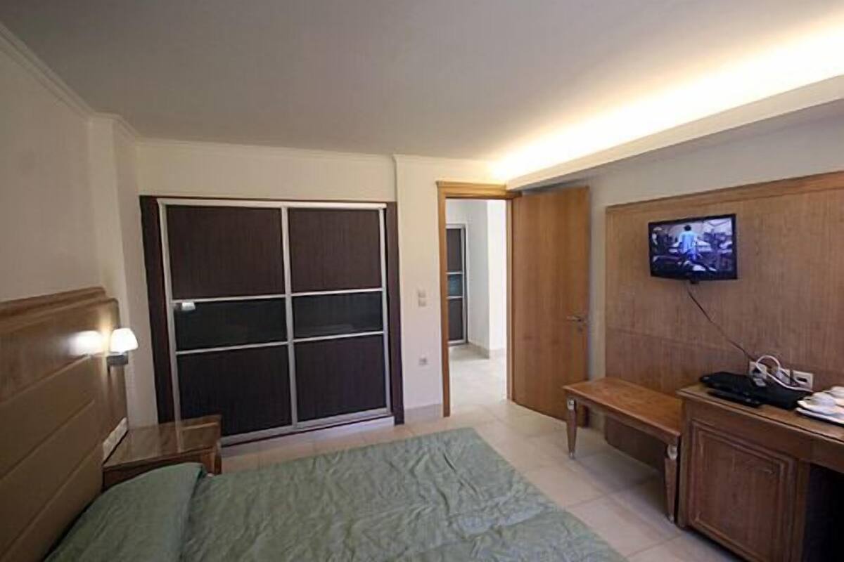 Family Room | In-room safe, blackout drapes, iron/ironing board (on request)