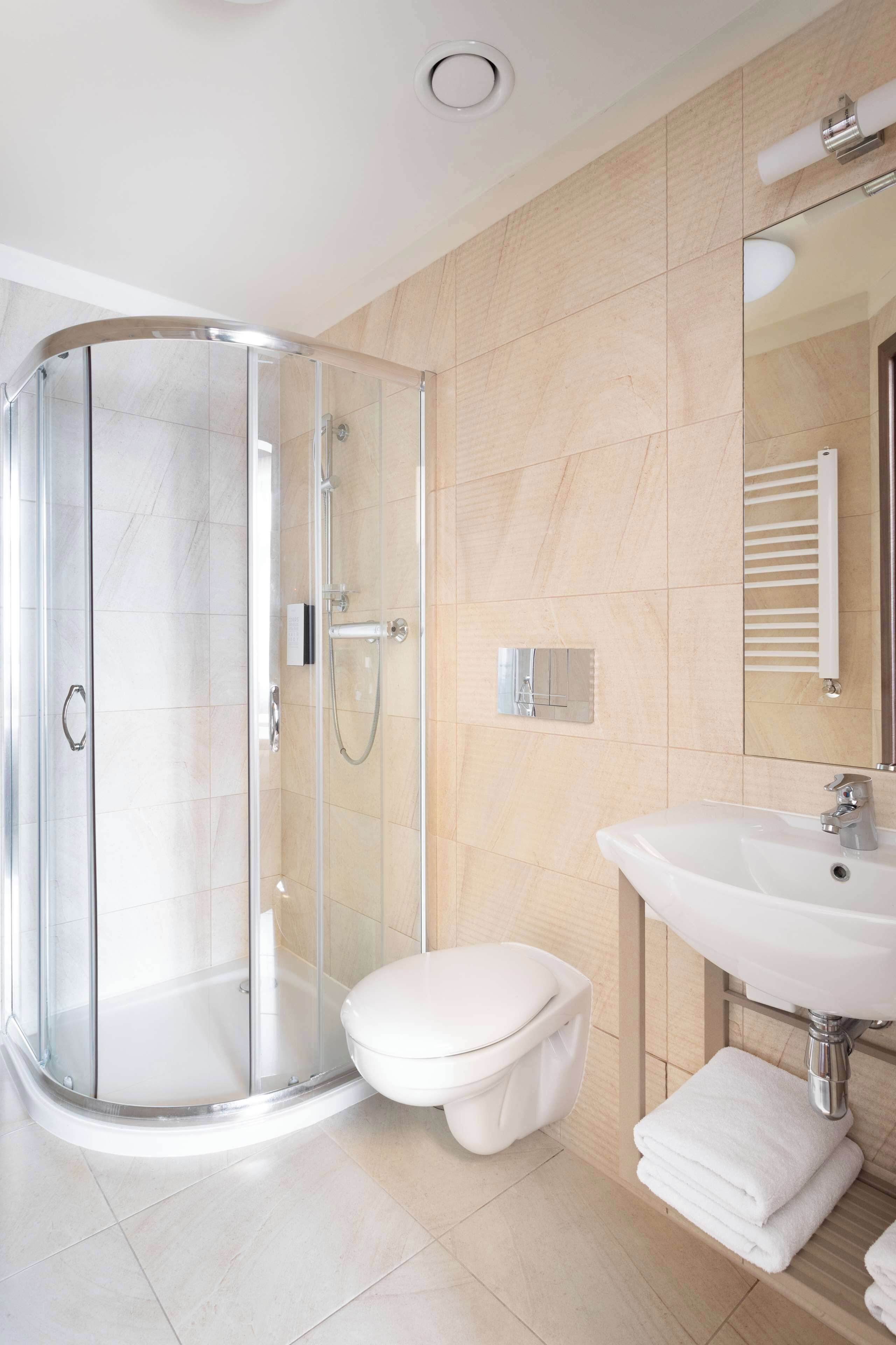 shower, eco-friendly toiletries, hair dryer, towels