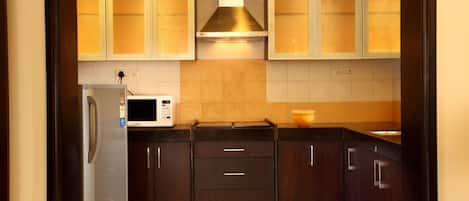 Two Bedroom Apartment | Private kitchen | Coffee/tea maker, electric kettle