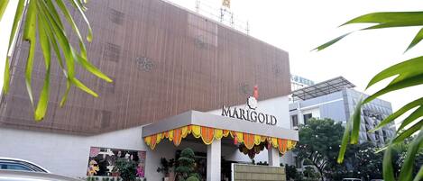 A building with a sign reading "MARIGOLD."