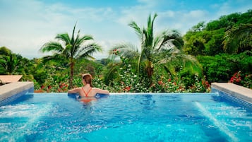 2 outdoor pools, open 9:00 AM to 9:00 PM, pool umbrellas, pool loungers