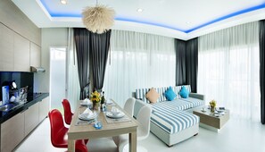 Penthouse Suite B | Living area | 32-inch LCD TV with cable channels, TV - Ratana Apart-Hotel at Kamala (Kamala)