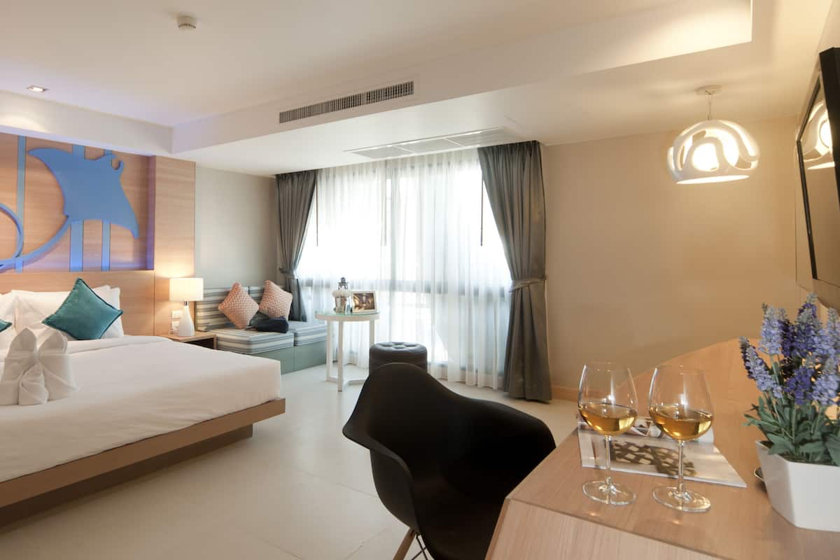 Grand kamer (Grand Superior) | Een kluis op de kamer, een bureau, gratis wifi, beddengoed