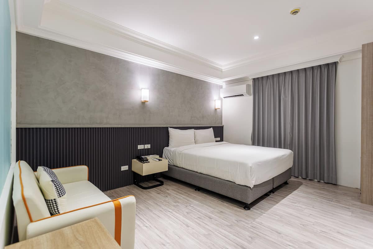 Senior Room | Minibar (free items), desk, laptop workspace, blackout drapes