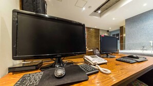 A hotel reception desk with two monitors, a telephone, a keyboard, and a mouse. - Hotel Yaja Yeongdeungpo (Seoul)