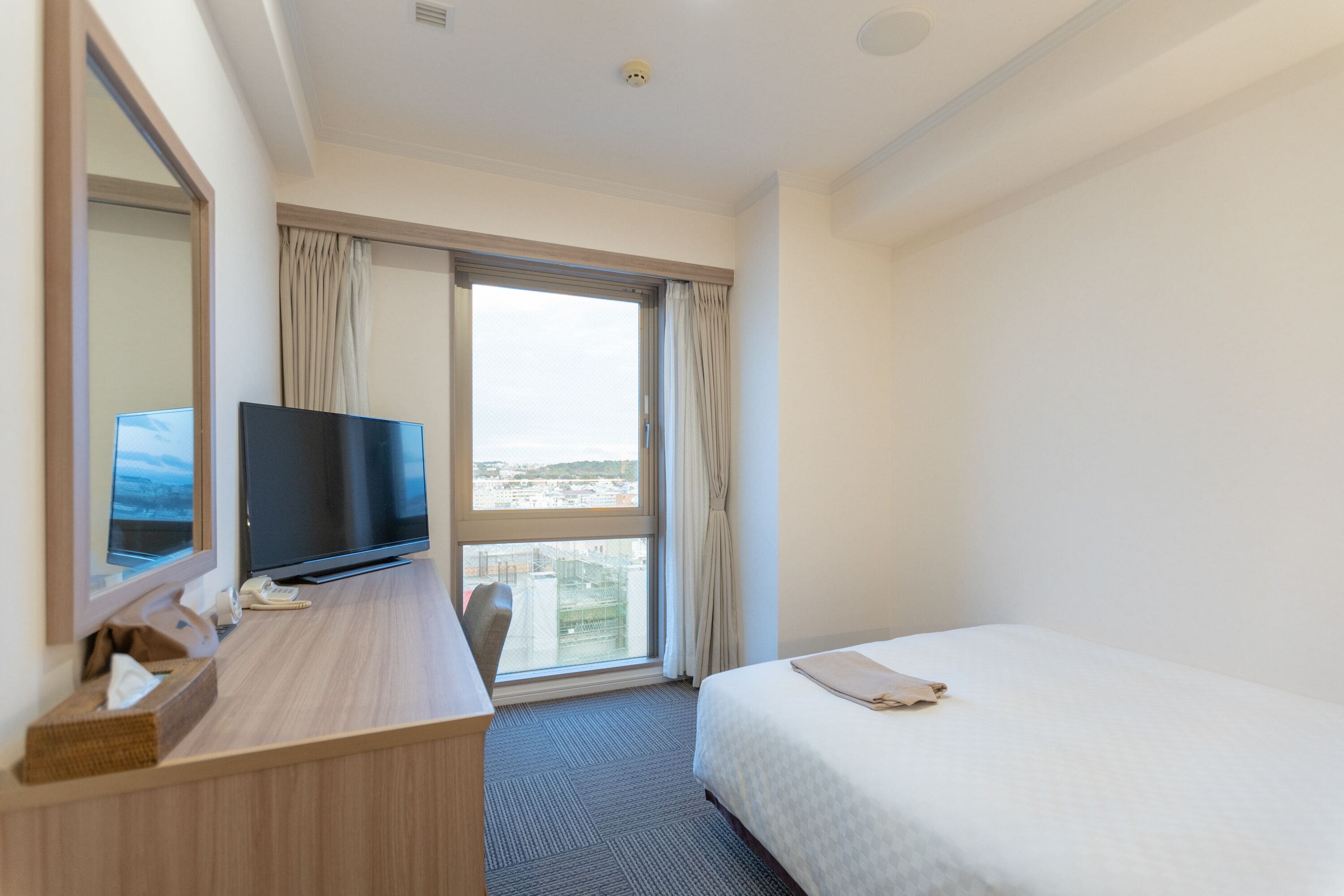 premium bedding, down duvets, desk, blackout curtains