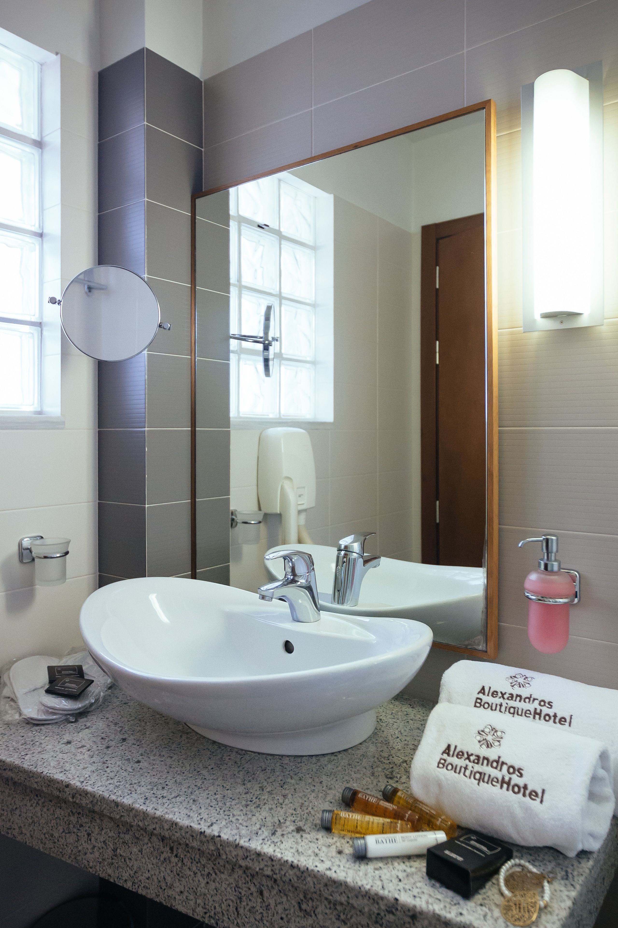 superior suite, balcony | bathroom amenities | shower, hydromassage showerhead, designer toiletries, hair dryer
