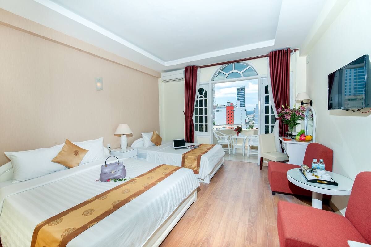 Family Triple Room, City View | Minibar, in-room safe, rollaway beds (surcharge), WiFi (free)