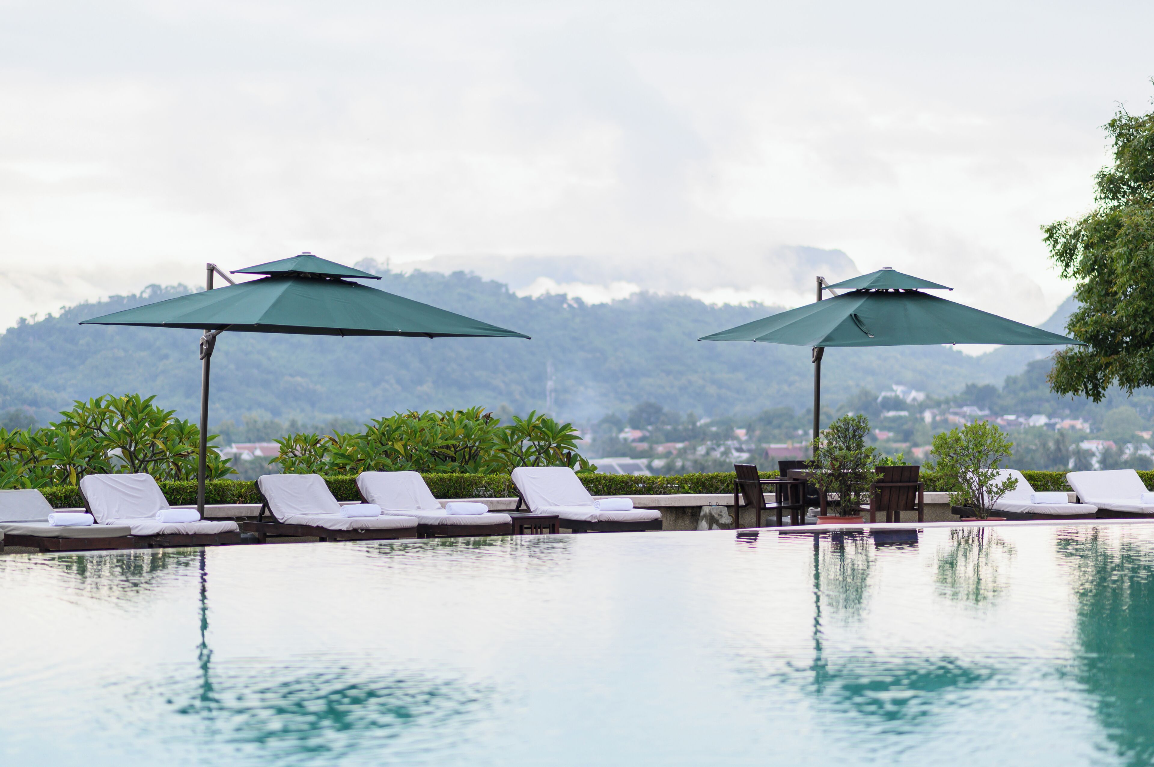 Outdoor pool, pool umbrellas, sun loungers