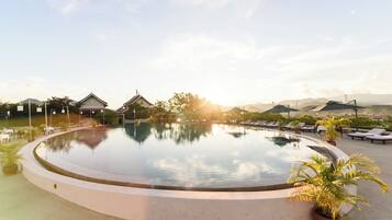 Outdoor pool, pool umbrellas, sun loungers