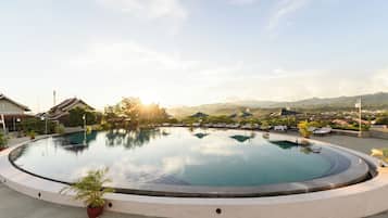 Outdoor pool, pool umbrellas, pool loungers