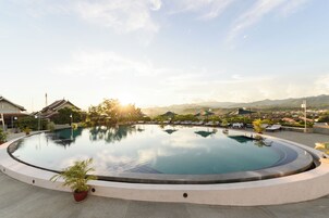 Outdoor pool, pool umbrellas, pool loungers