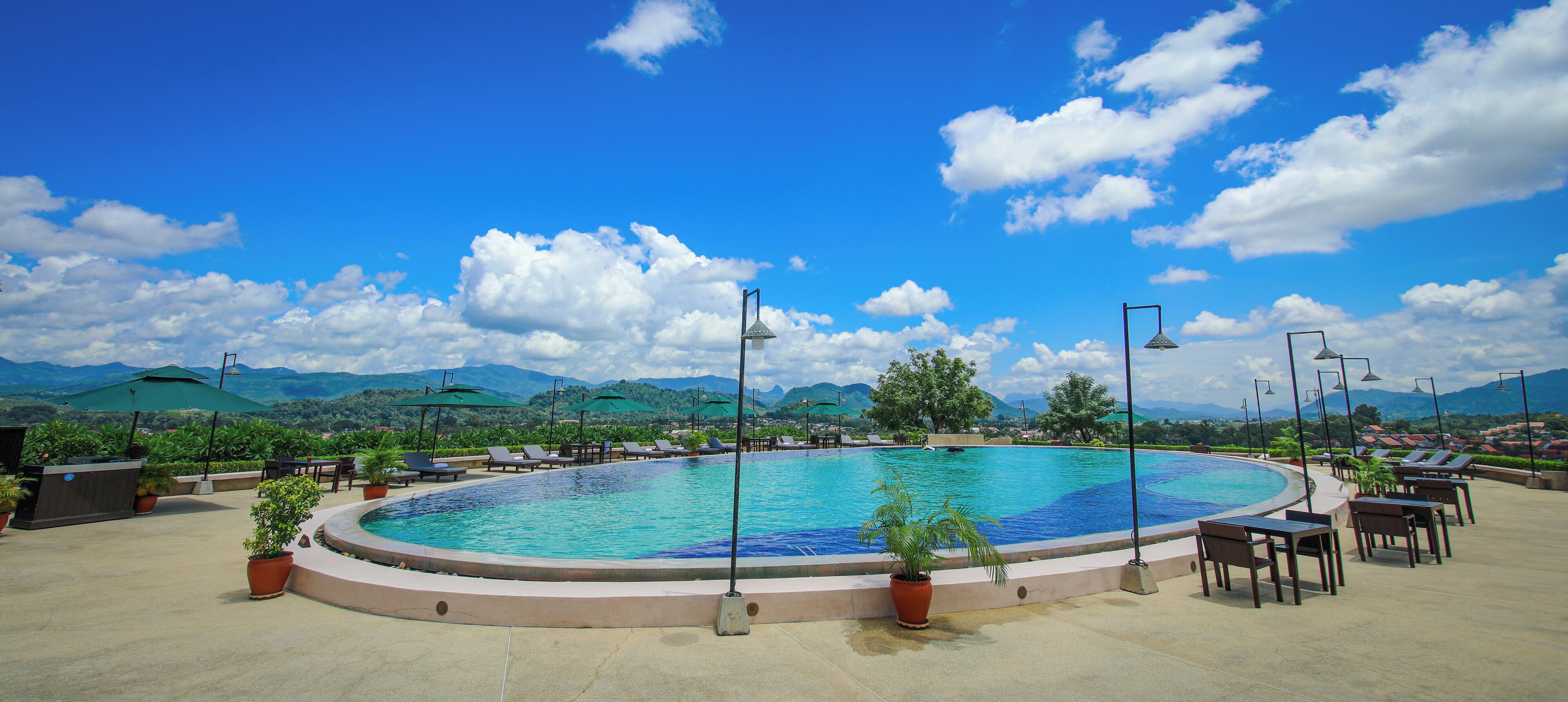 outdoor pool, pool umbrellas, pool loungers