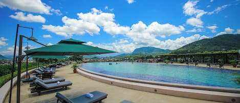 Outdoor pool, pool umbrellas, pool loungers