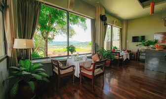 Breakfast, lunch, dinner served; international cuisine, alfresco dining 