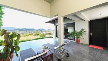 Pool Villa Room | Minibar, in-room safe, individually decorated, desk