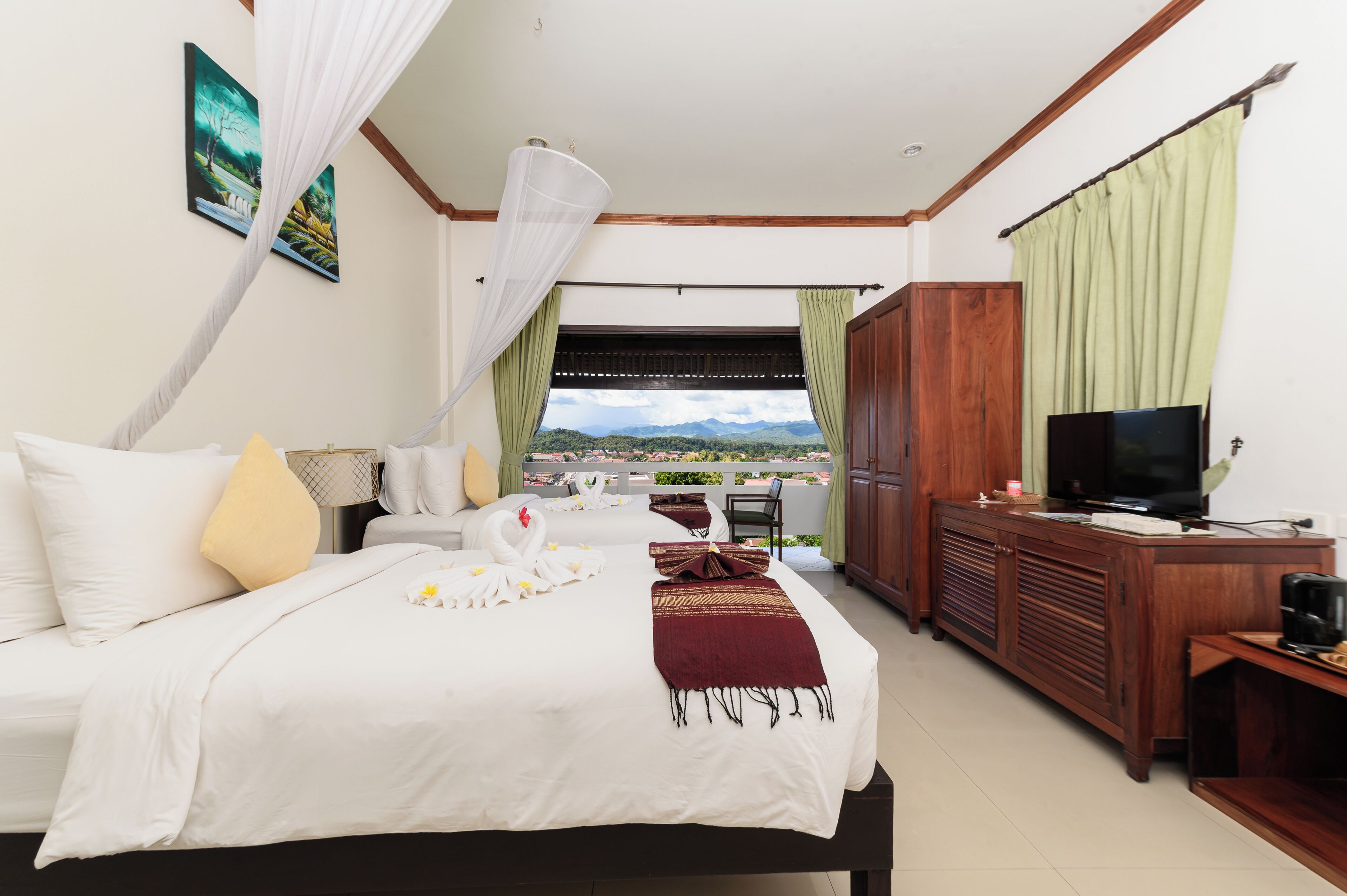 Standard Twin Room | Minibar, in-room safe, individually decorated, desk