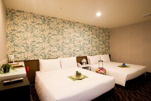 Quadruple Room | Desk, iron/ironing board, free cots/infant beds, bed sheets - Ximen Holiday Fun Hotel (Taipei)