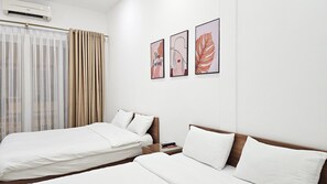 Family Room, Balcony | Desk, laptop workspace, blackout drapes, free WiFi - Especen Hotel (Hanoi)