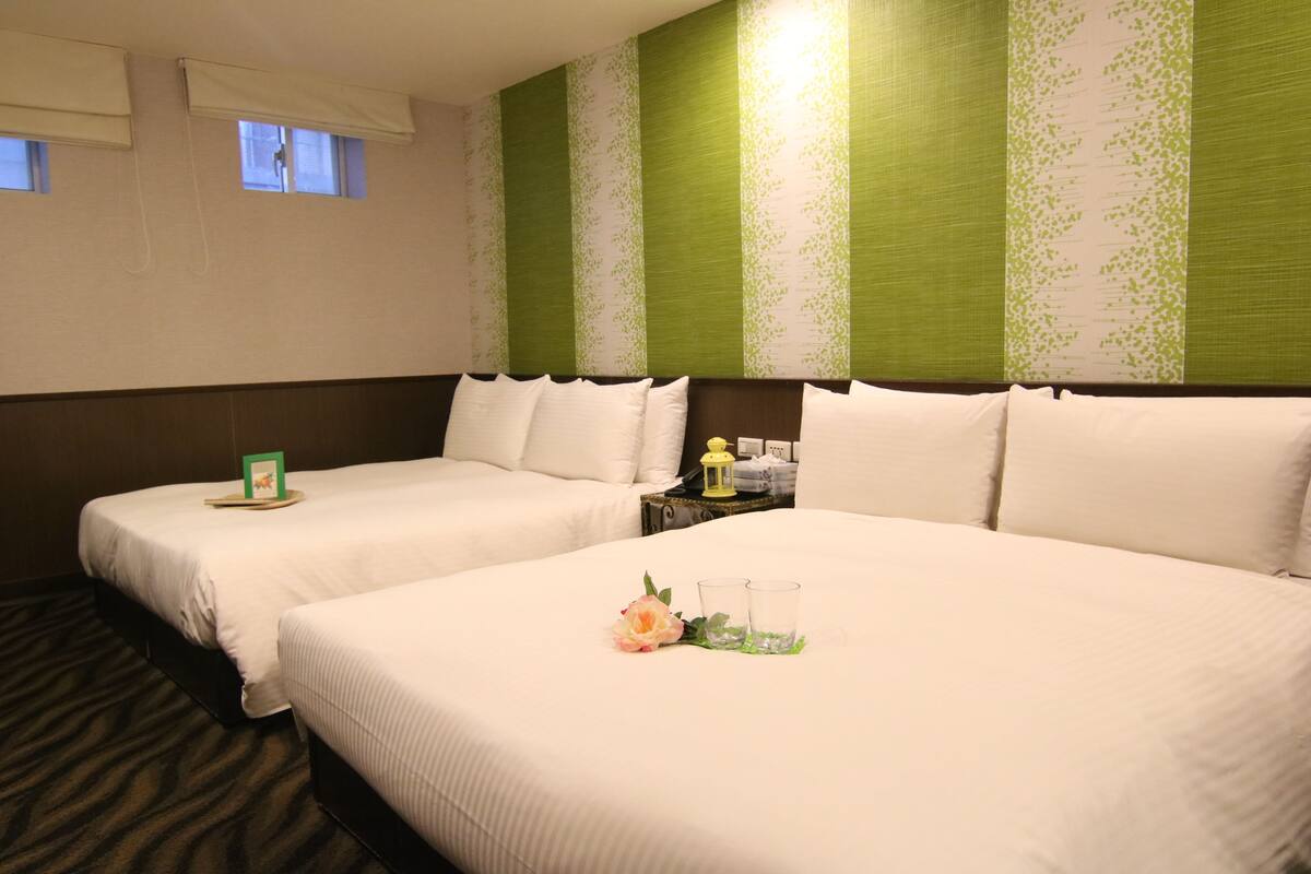 Quadruple Room | Down comforters, in-room safe, desk, blackout drapes