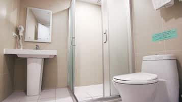 Eco-friendly toiletries, hair dryer, slippers, towels