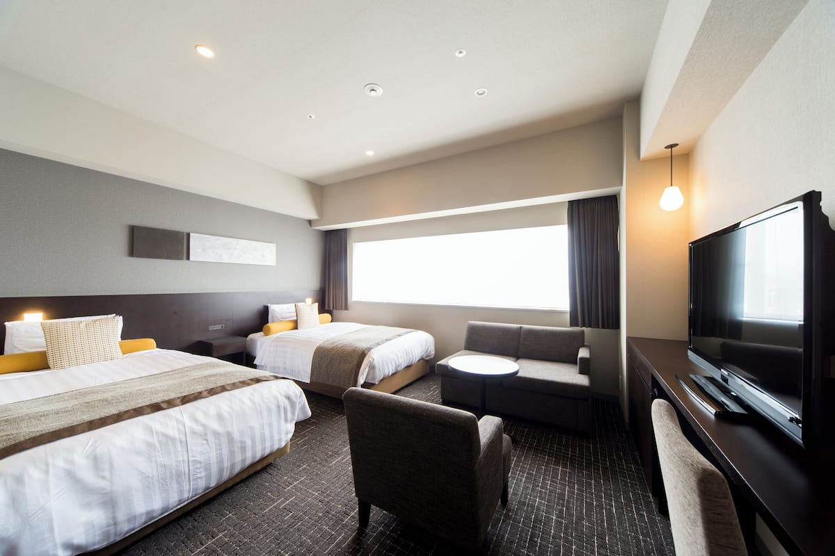 superior twin room | down duvets, in-room safe, blackout curtains, soundproofing