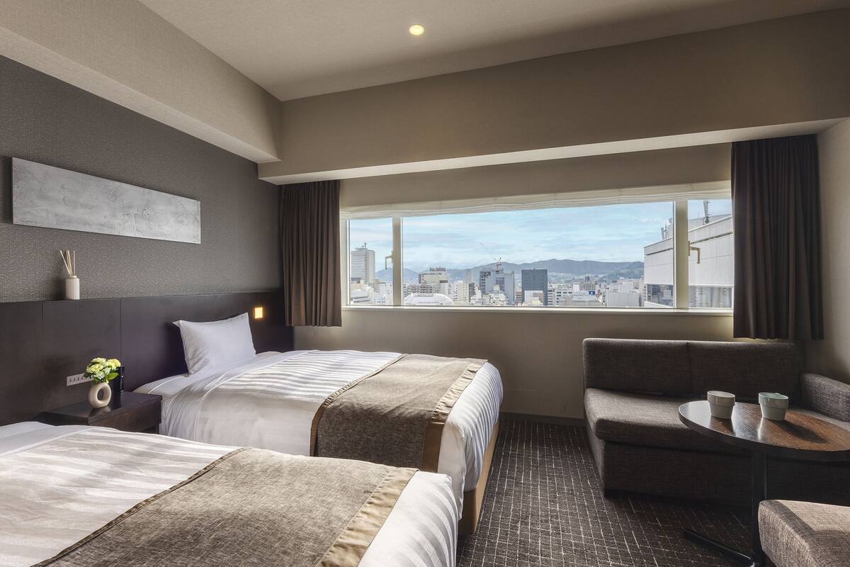 superior twin room | down duvets, in-room safe, blackout curtains, soundproofing