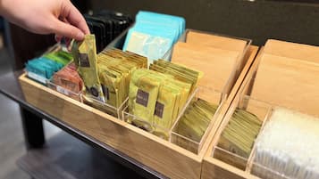 A display of bath salts in various colors and packaging styles.