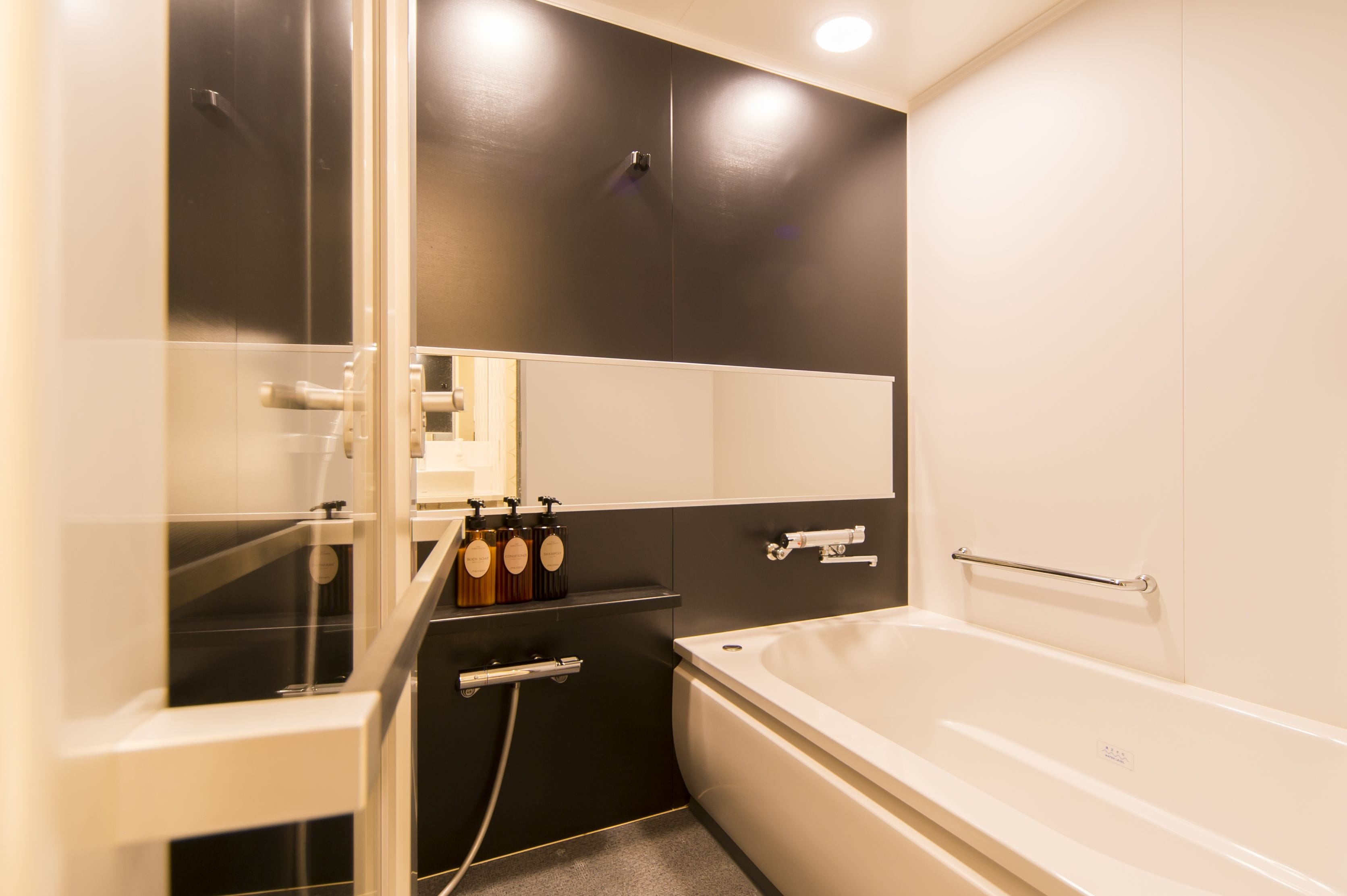 separate bathtub and shower, deep-soaking bathtub, free toiletries