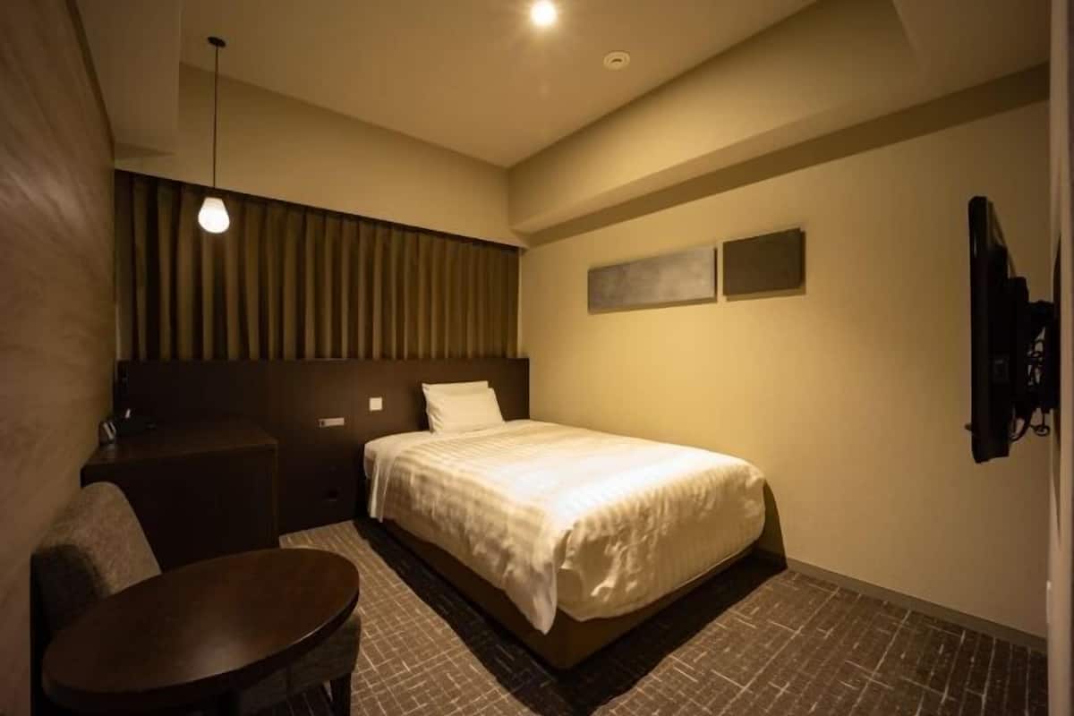 Couette en duvet, coffre-fort, rideaux d’obscurcissement