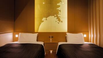 A hotel room with two beds, a nightstand, and a wall-mounted map.