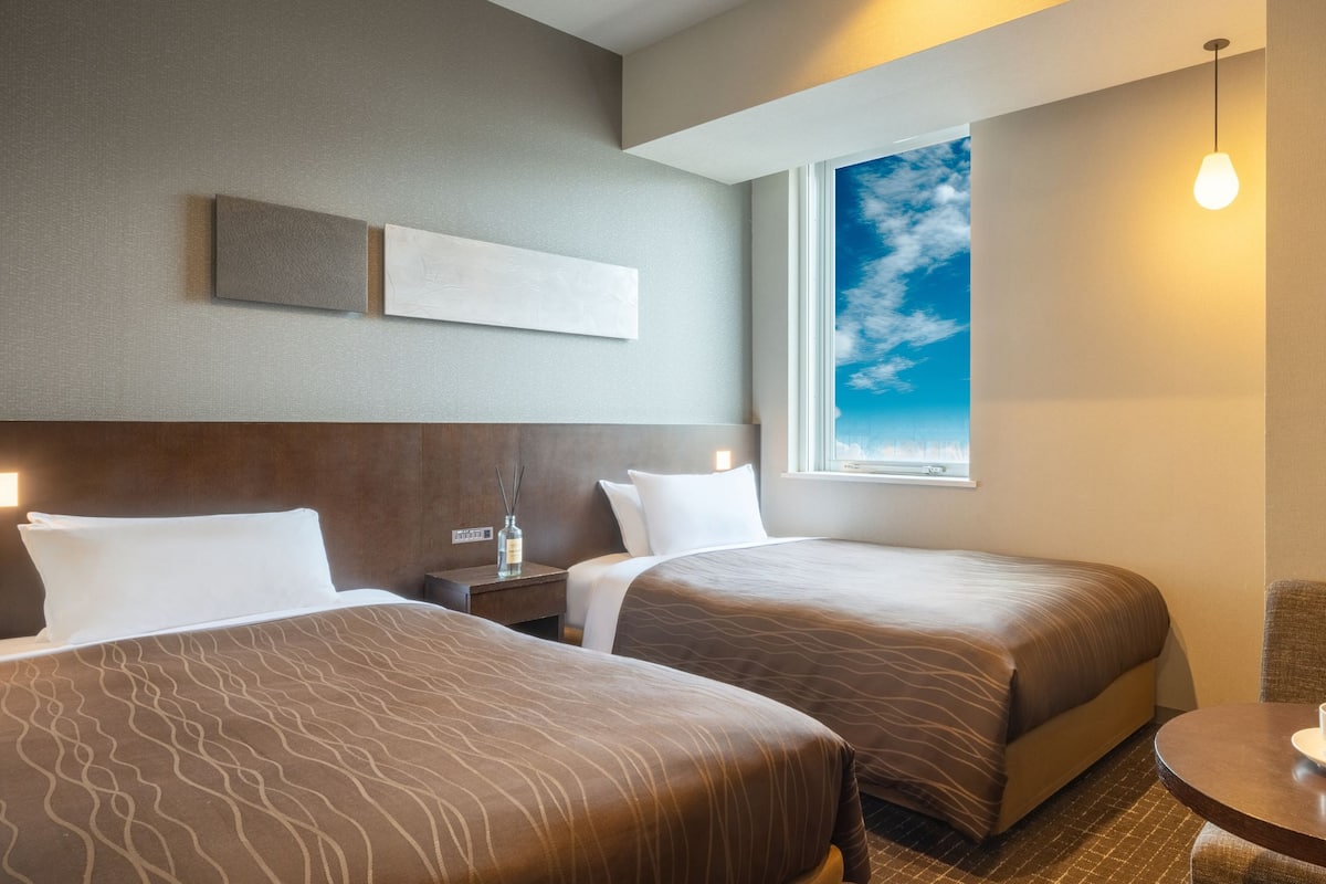 Couette en duvet d'oie, rideaux occultants, Wi-Fi gratuit, draps fournis