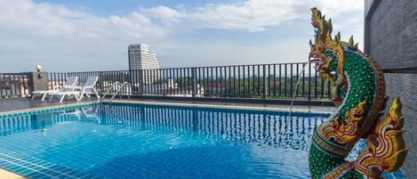 Outdoor pool, open 7:00 AM to 7:00 PM, sun loungers