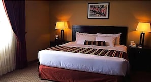 Premium bedding, pillow-top beds, in-room safe, desk