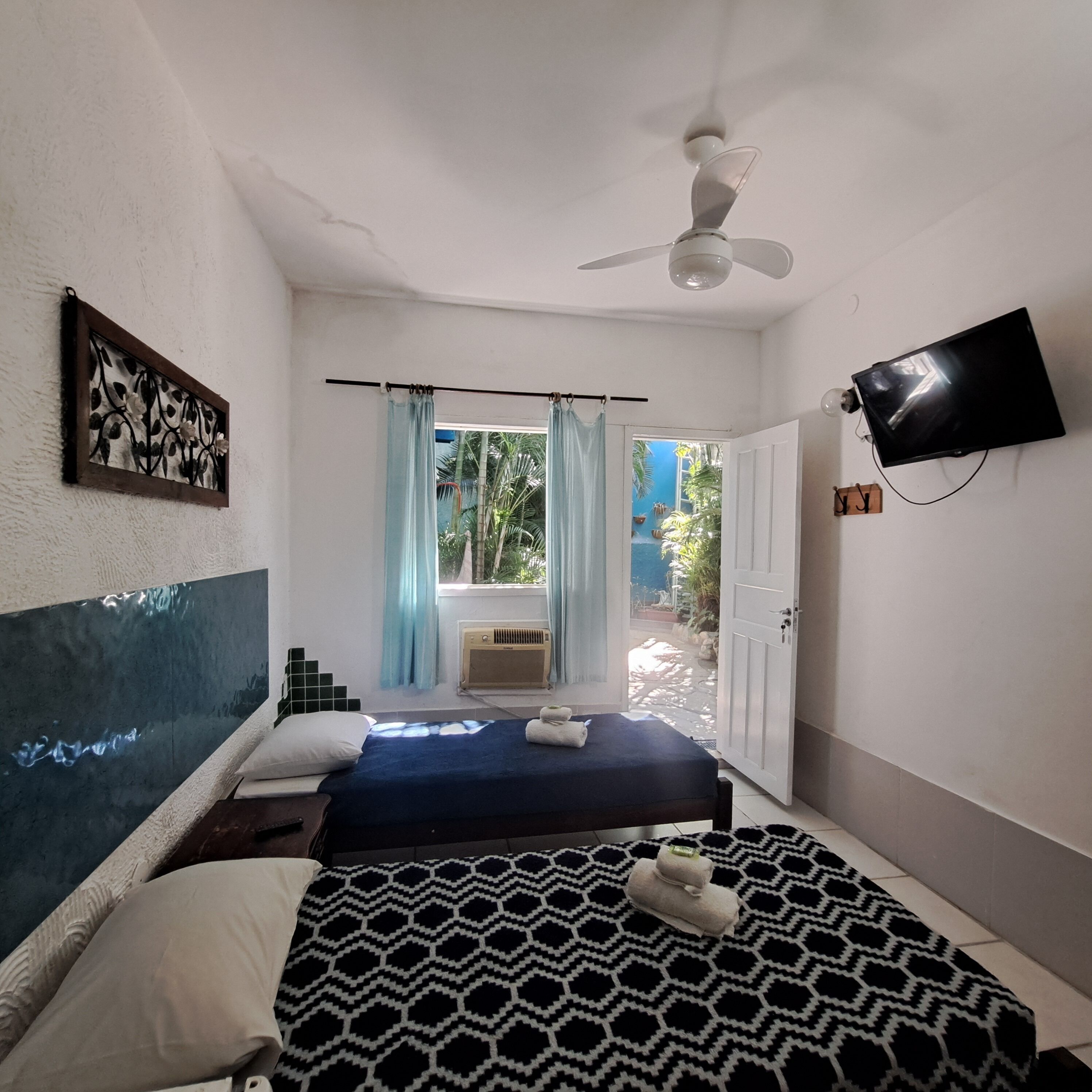 Quarto Duplo Solteiro | Frigobar, cofres nos quartos, Wi-Fi de cortesia, roupa de cama