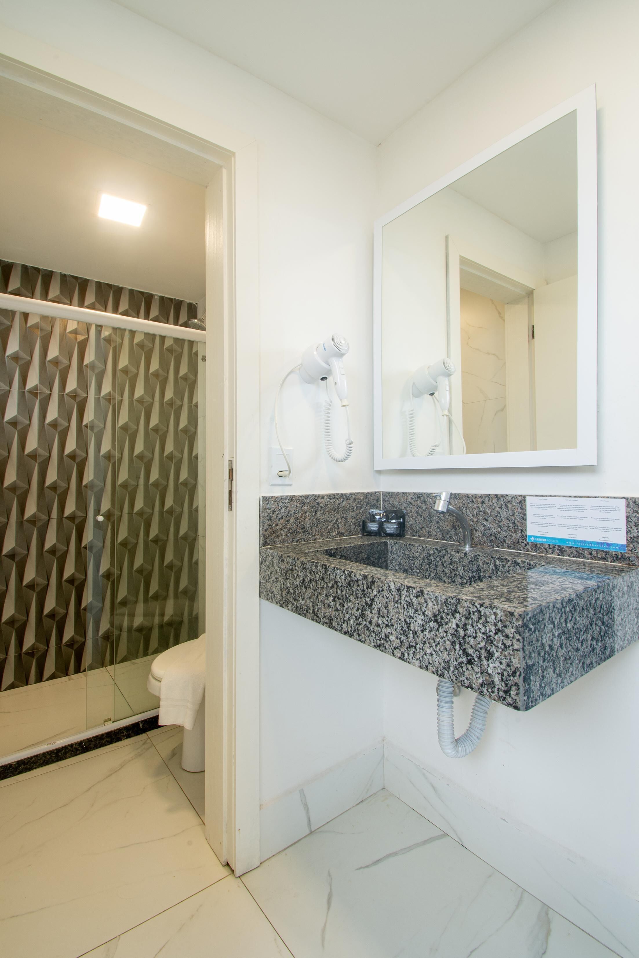 bathroom | shower, hair dryer, bidet, towels