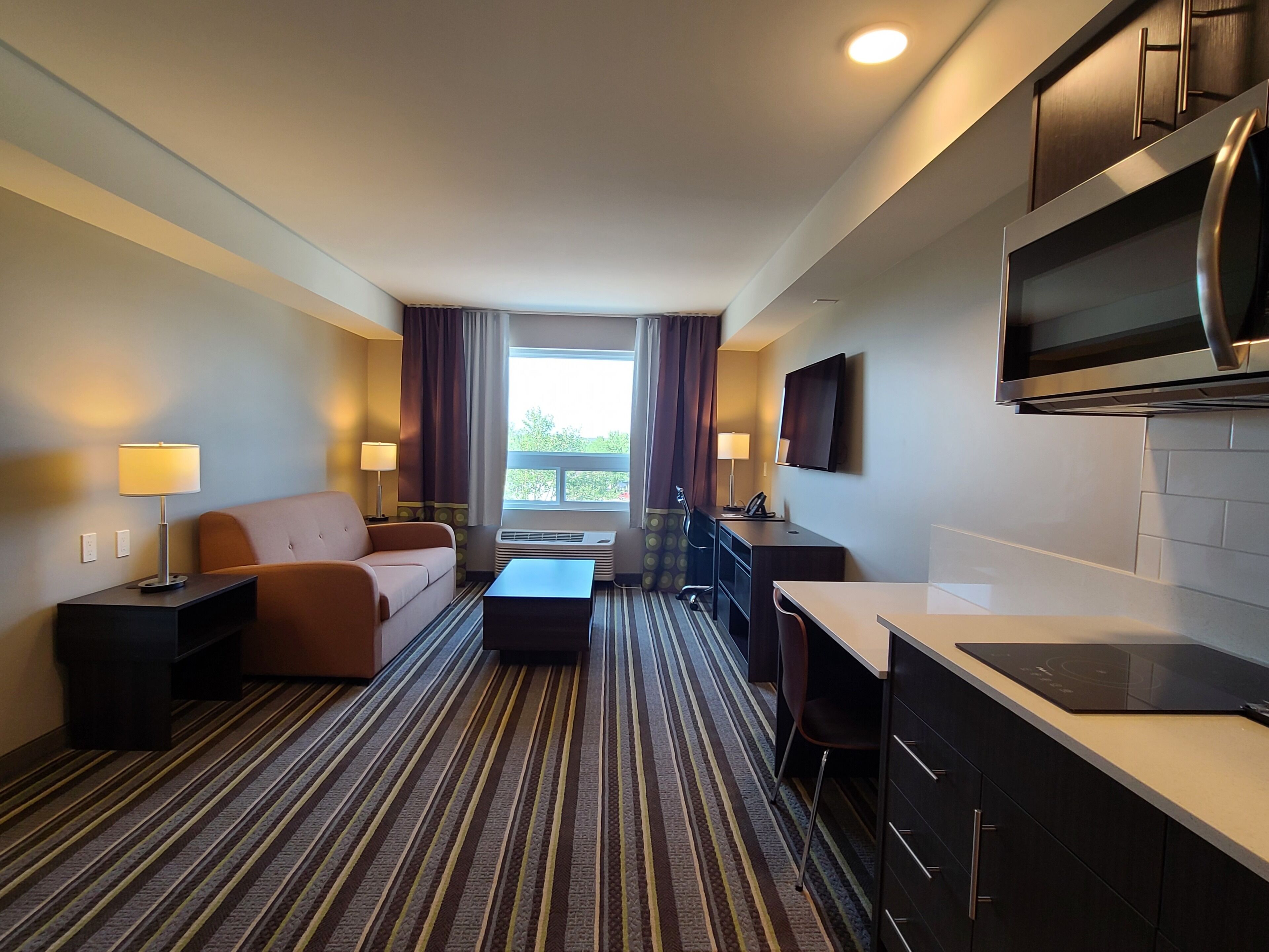 suite, 1 bedroom, non smoking | blackout curtains, iron/ironing board, free cots/infant beds