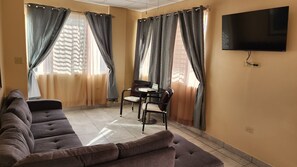 Premier Suite | Living area | LED TV