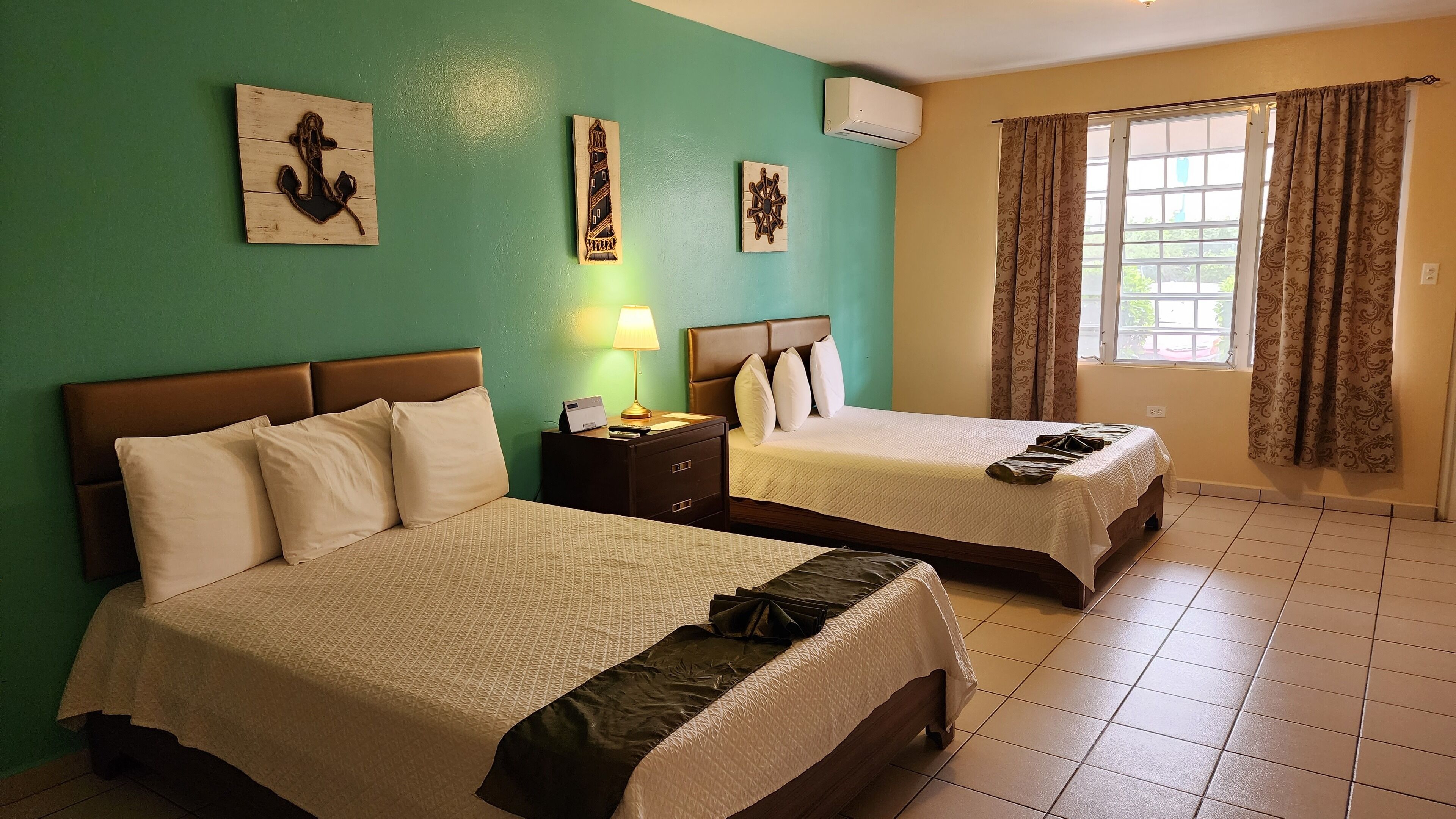 standard room, 2 queen beds | 1 bedroom, in-room safe, soundproofing, iron/ironing board