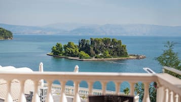 Superior Suite with private terrace and Pontikonisi island view | View from room