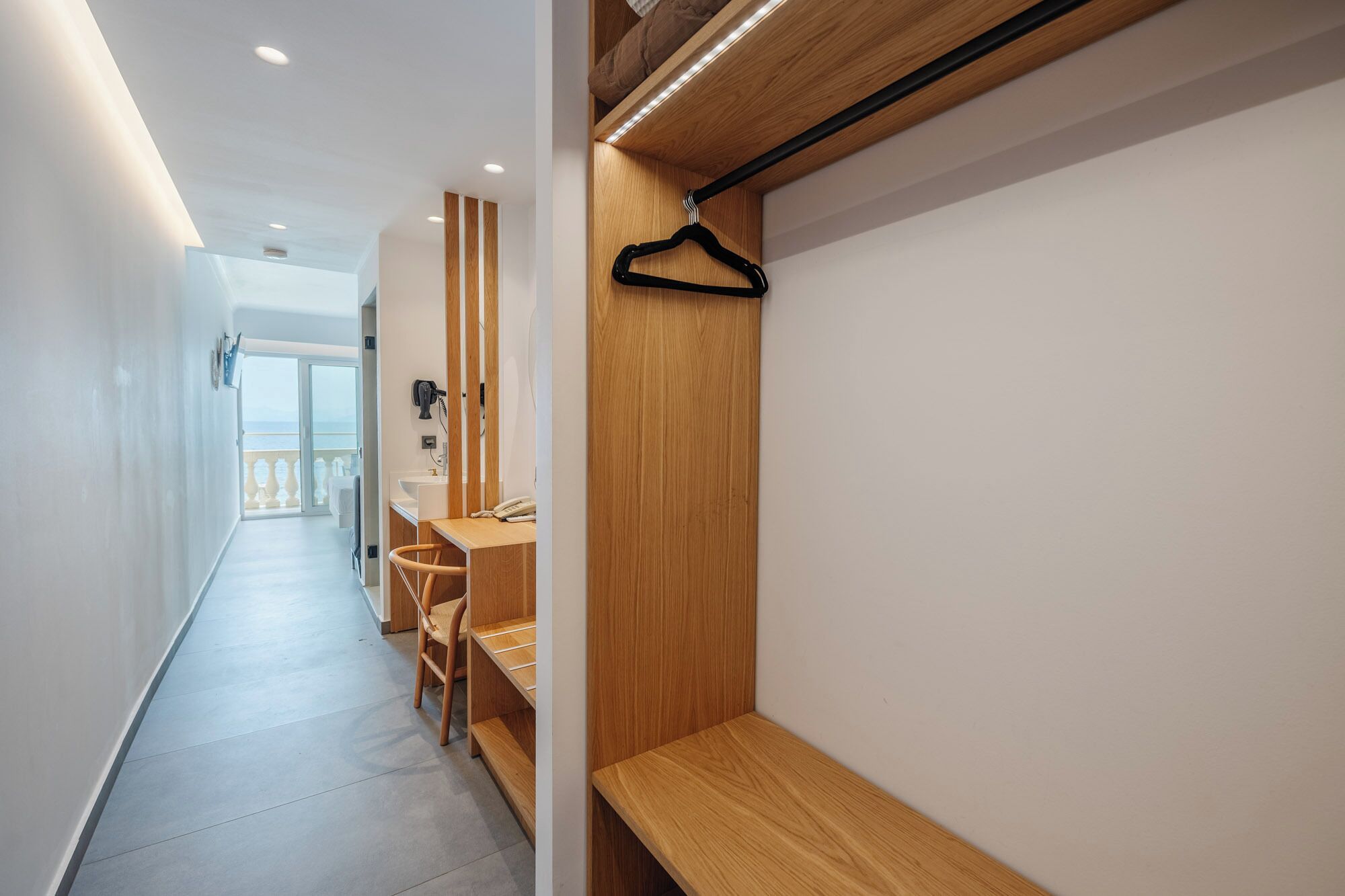 deluxe suite with balcony and pontikonisi island view | 1 bedroom, minibar, in-room safe, blackout curtains